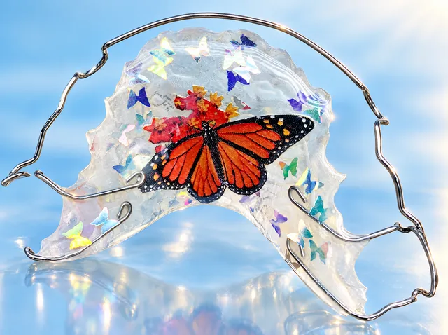 Clear with butterfly glitter and a monarch butterfly
