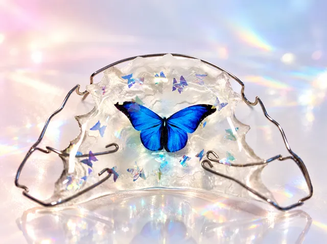 Butterfly glitter with a blue and black butterfly