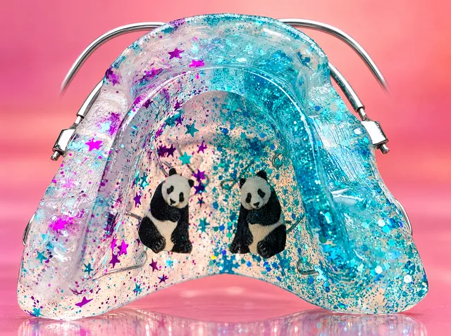 Half violet-turquoise stars, half blue snowflakes, with pandas